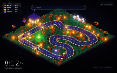 Halloween Kart Track New Tab theme: a block-built go-kart circuit at night seen from one corner, with a red kart crashing into the tyre wall in a burst of sparks, a teal kart reaching a row of treat boxes, glowing jack-o'-lanterns and lamp posts around the track, ghost fans in a grandstand and a scoreboard in the top left