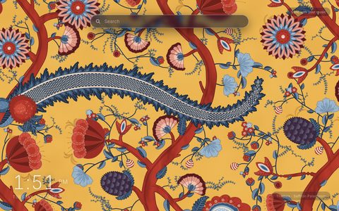 Saffron Palampore New Tab theme: coral-red trunks, indigo leaves, red and pink block-print flowers and a blue scale-patterned serpent vine on a saffron-yellow ground